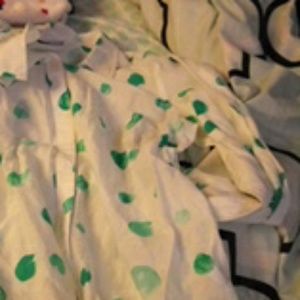 White shirt with green pokadots